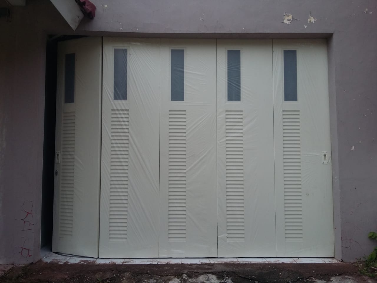 harga pintu garasi